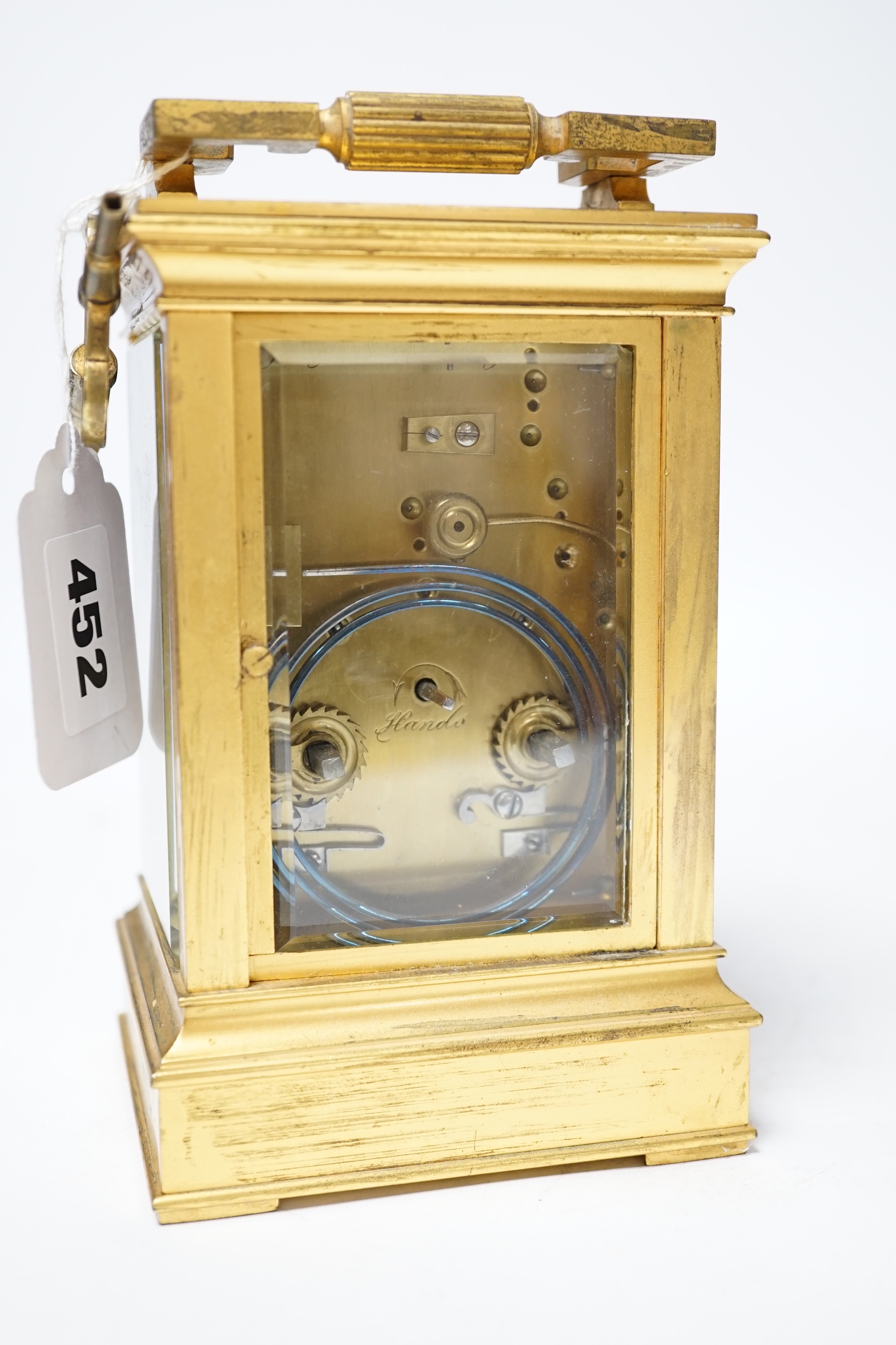 A late 19th century French gilt brass cased eight day repeating carriage clock with key, 17cm